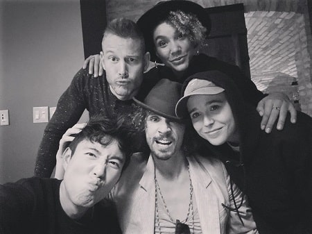 A picture of Emmy Raver-Lampman with her co-stars or siblings from The Umbrella Academy.